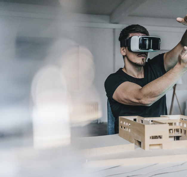 young man wearing VR glasses 