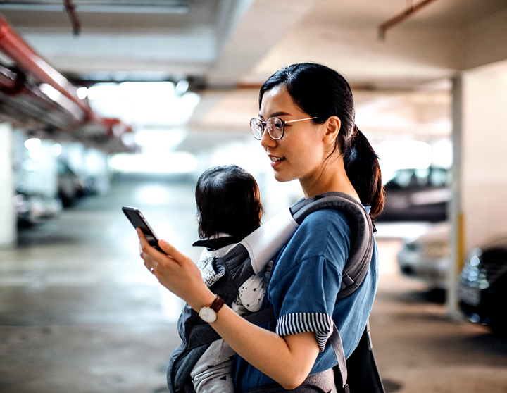 woman with child in a parking garage 