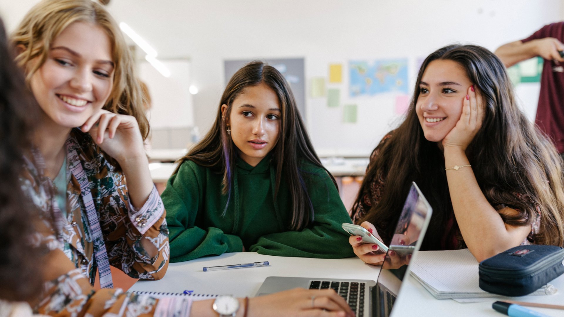 three girls studying