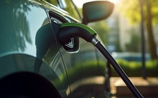 Car being charged on an ev charging station.