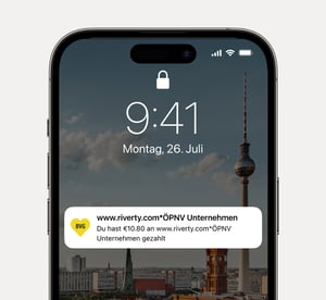 Smartphone screen with BVG App notification showing information about payment done with Riverty.
