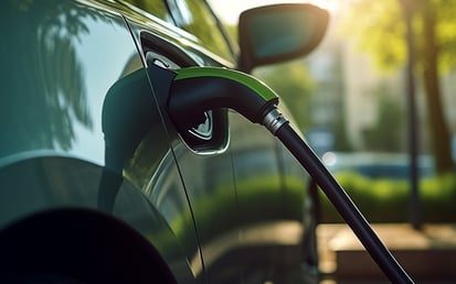 Car being charged on an ev charging station.