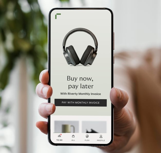 Rivertys' 4.8 star rated buy now, pay later app opened on a Smartphone screen.
