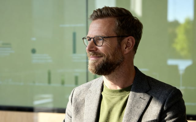 Man looking out the window