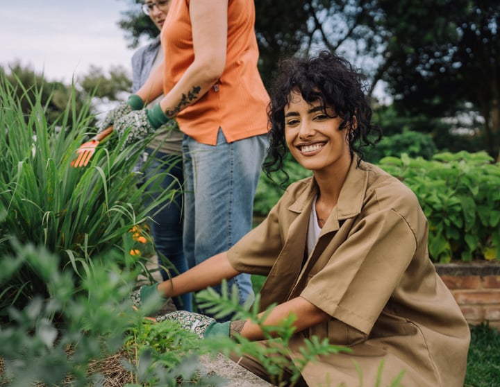 Smiling woman doing gardening